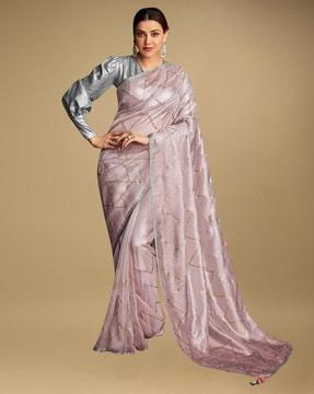 embellished saree with tassels