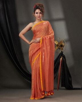 embellished saree with tassels