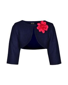 embellished shrug with button-loop closure