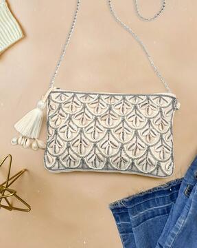 embellished sling bag with chain strap