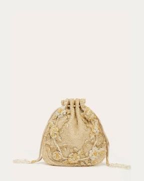 embellished sling bag with drawstring closure