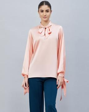 embellished top with neck tie-up