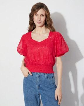 embellished top with smocked detail