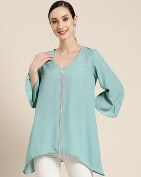 embellished v-neck top with curved hem