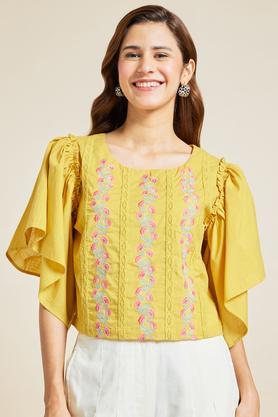 embroidered cotton slub round neck women's casual wear tunic - mustard