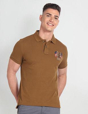 embroidered logo muscle fit polo shirt