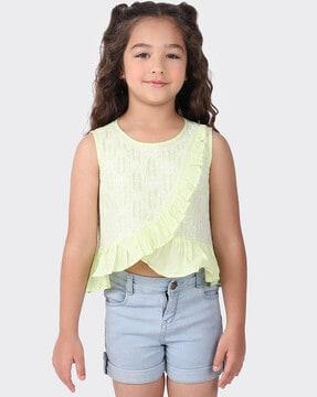 embroidered top with ruffled overlay