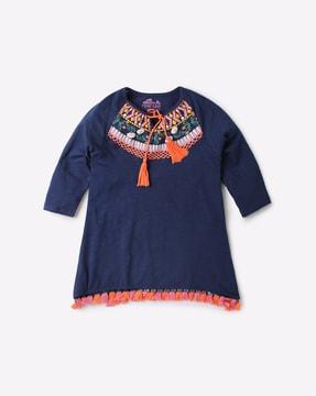 embroidered top with tassels