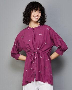 embroidered tunic with cinched waist