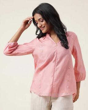embroidered tunic with curved hem