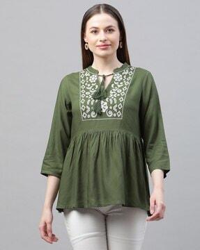 embroidered tunic with neck tie-up