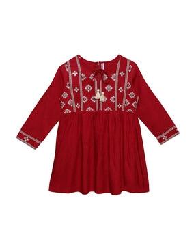 embroidered tunic with tassels