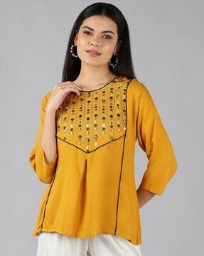 embroidered accent round neck top