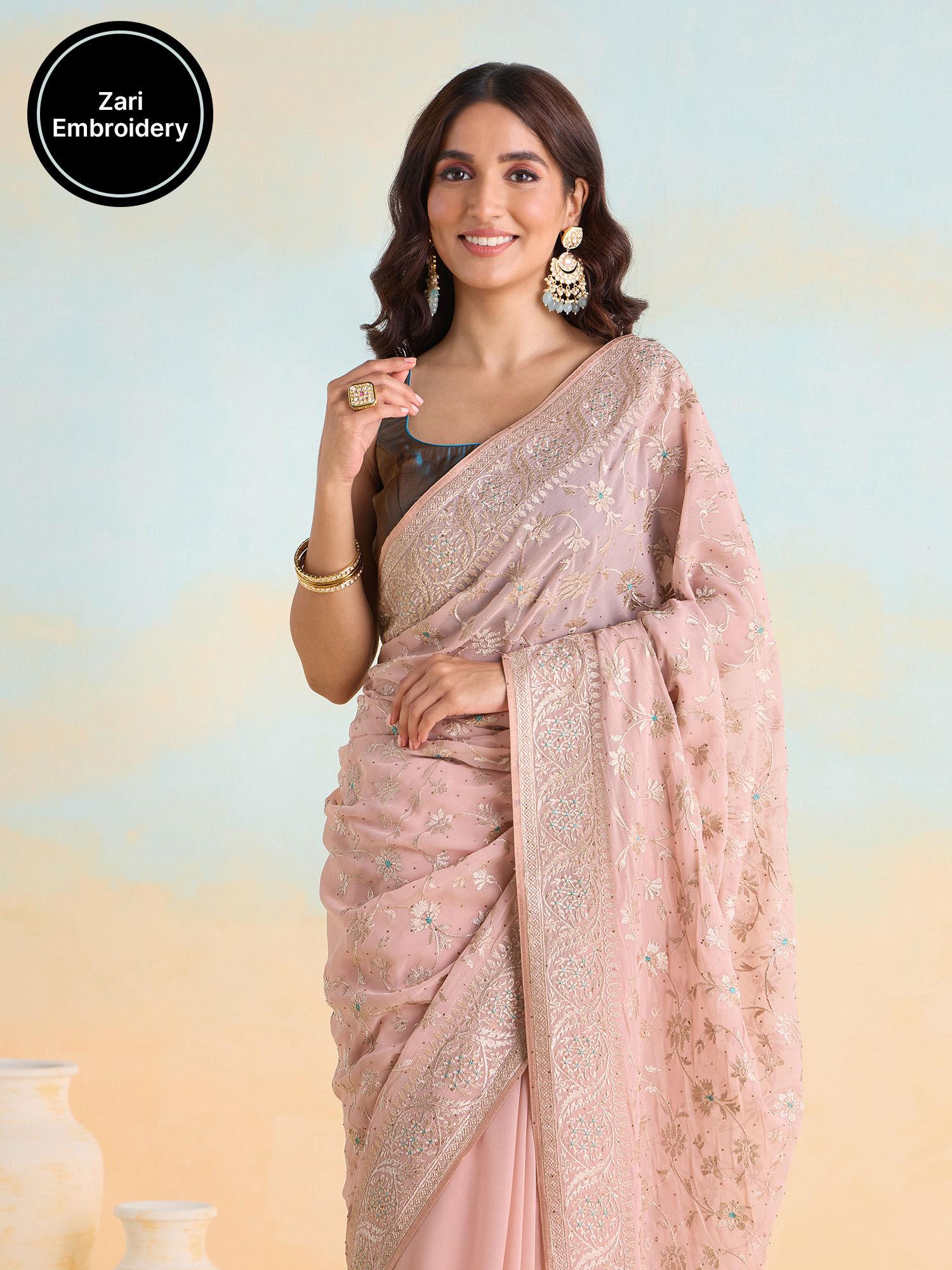 embroidered and embellished light peach saree with unstitched blouse likparsar06