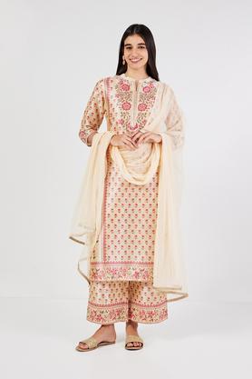 embroidered calf length art silk woven women's kurta set - peach