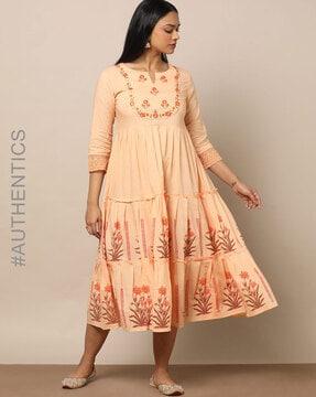 embroidered flared dress with block print