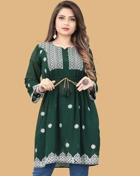 embroidered flared tunic with cinched waist