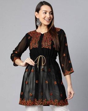 embroidered flared tunic with notched neckline