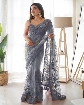 embroidered net saree with tassels