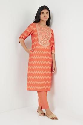 embroidered polyester blend round neck women's festive wear kurta - coral