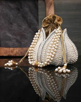 embroidered potli bag with pearl sling