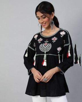 embroidered round-neck top with tassels