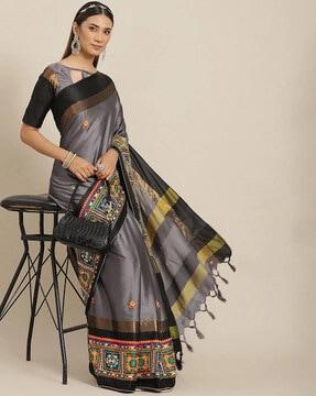 embroidered saree with tassels