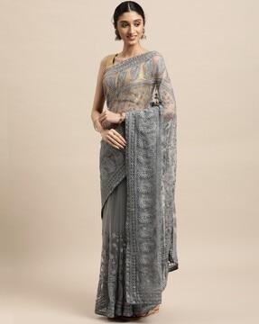 embroidered sheer-through net saree
