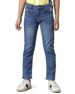 embroidered slim fit jeans with 5-pocket styling