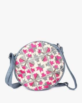 embroidered sling bag with adjustable strap