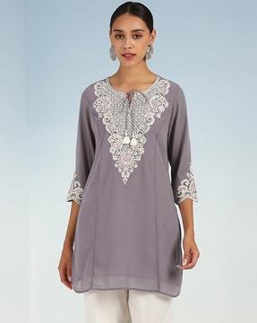 embroidered straight tunic with neck tie-up