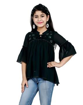 embroidered top with asymmetric hem
