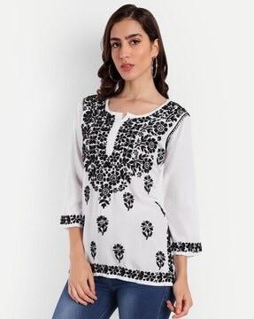 embroidered top with extended sleeves