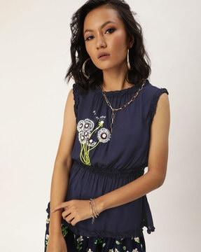 embroidered top with flared hem