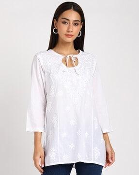 embroidered top with neck tie-up