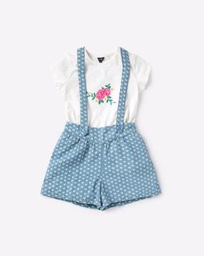embroidered top with printed dungarees