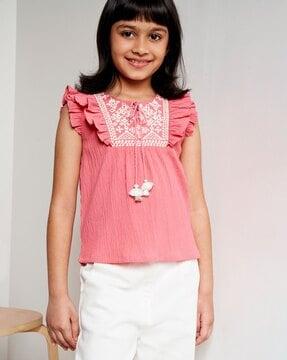 embroidered top with ruffle trim