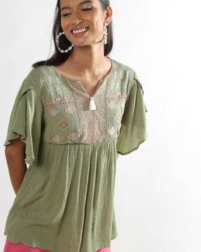 embroidered top with ruffles