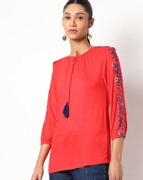 embroidered top with tie-up neckline