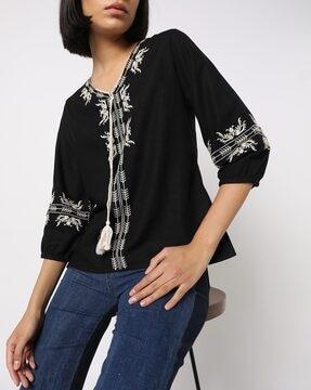 embroidered top with tie-up neckline