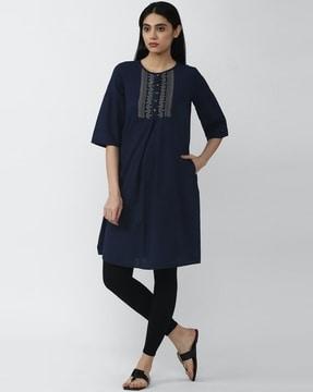 embroidered tunic with insert pocket