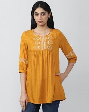 embroidered tunic with insert pocket