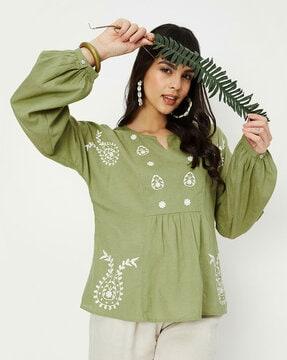 embroidered tunic with notched neckline