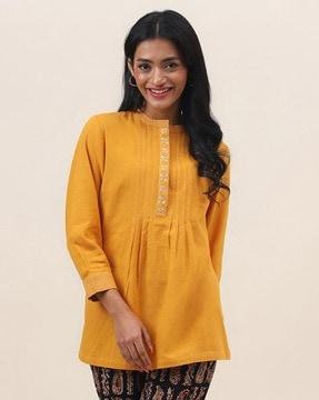 embroidered tunic with pintuck detail