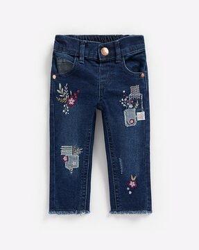 embroidered washed jeans with applique