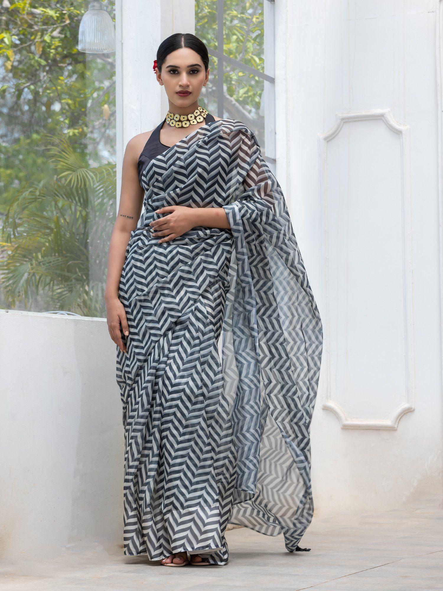 enigma chiffon printed saree with latkans and unstitched blouse