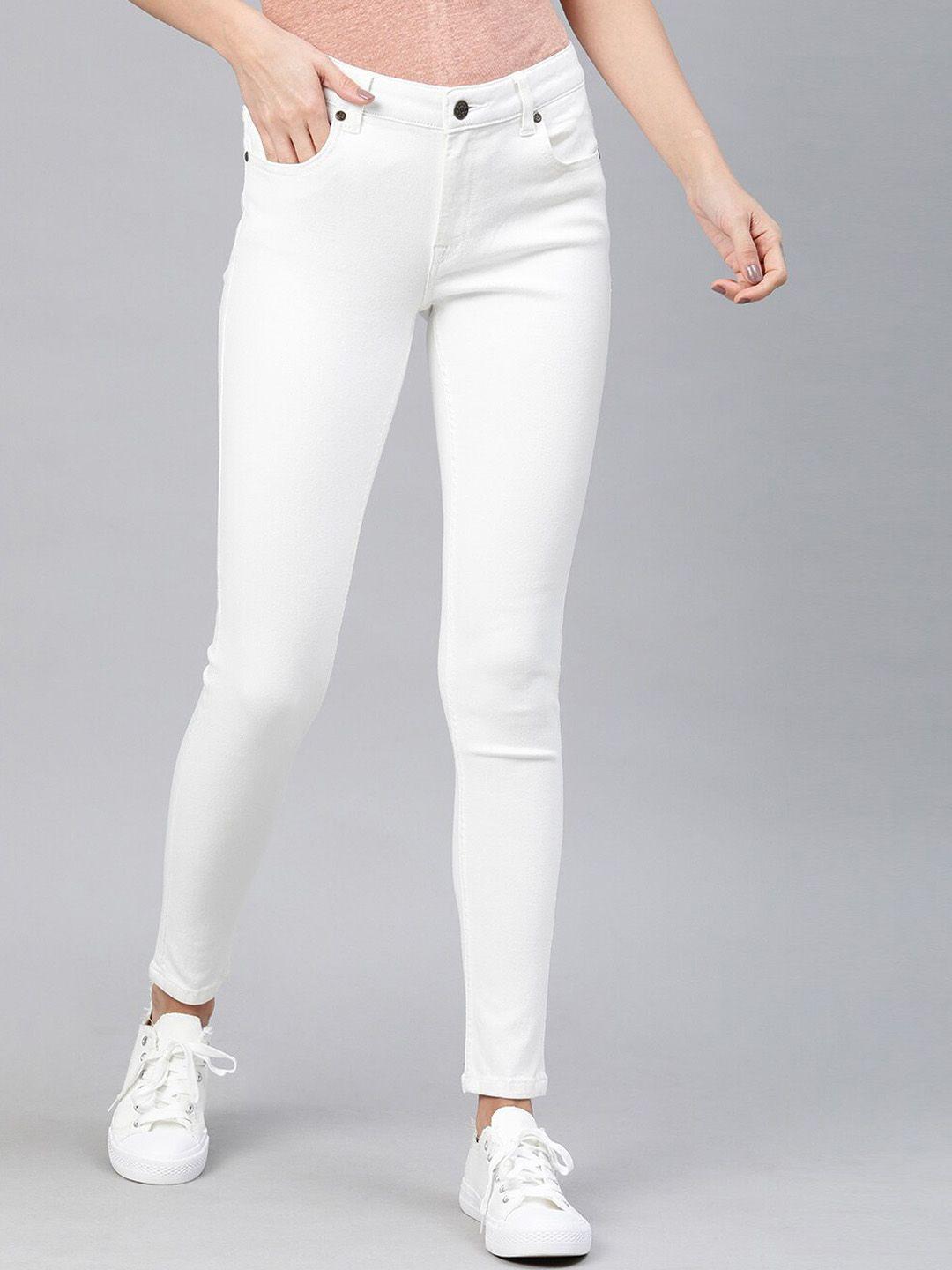 enviously young women white slim fit stretchable jeans