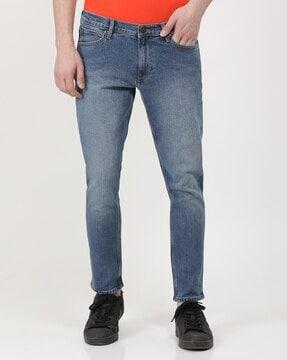 eric skinny fit mid-wash jeans