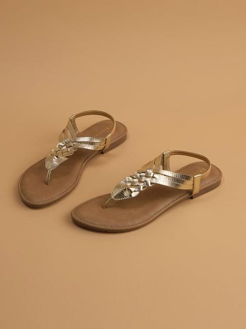 eridani women's bizzy gold t-strap sandals