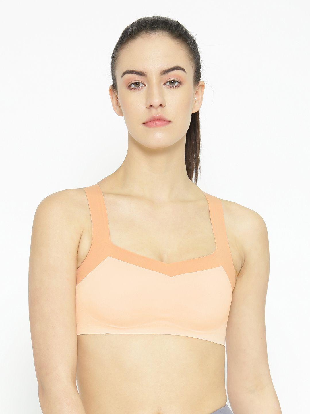 erotissch peach-coloured solid non-wired lightly padded sports bra aib-16a